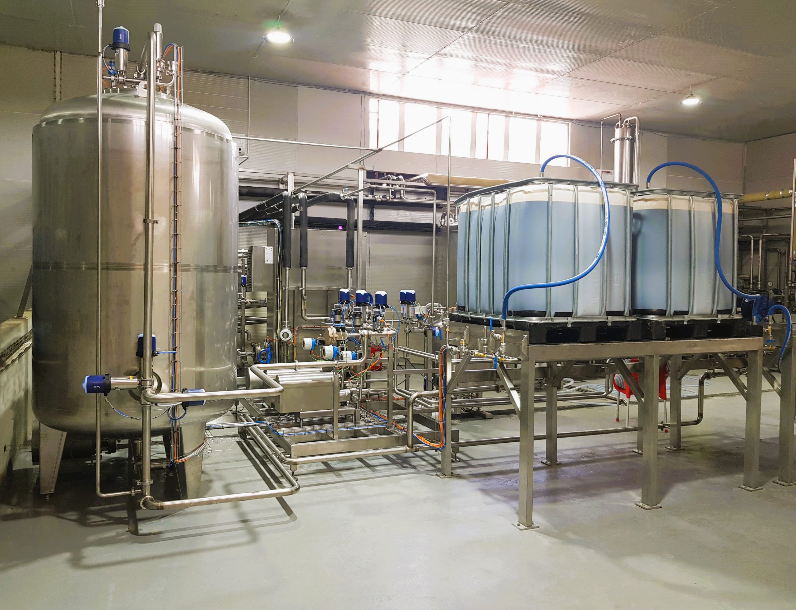 Image montrant un système de production de boisson avec réseau de tuyaux